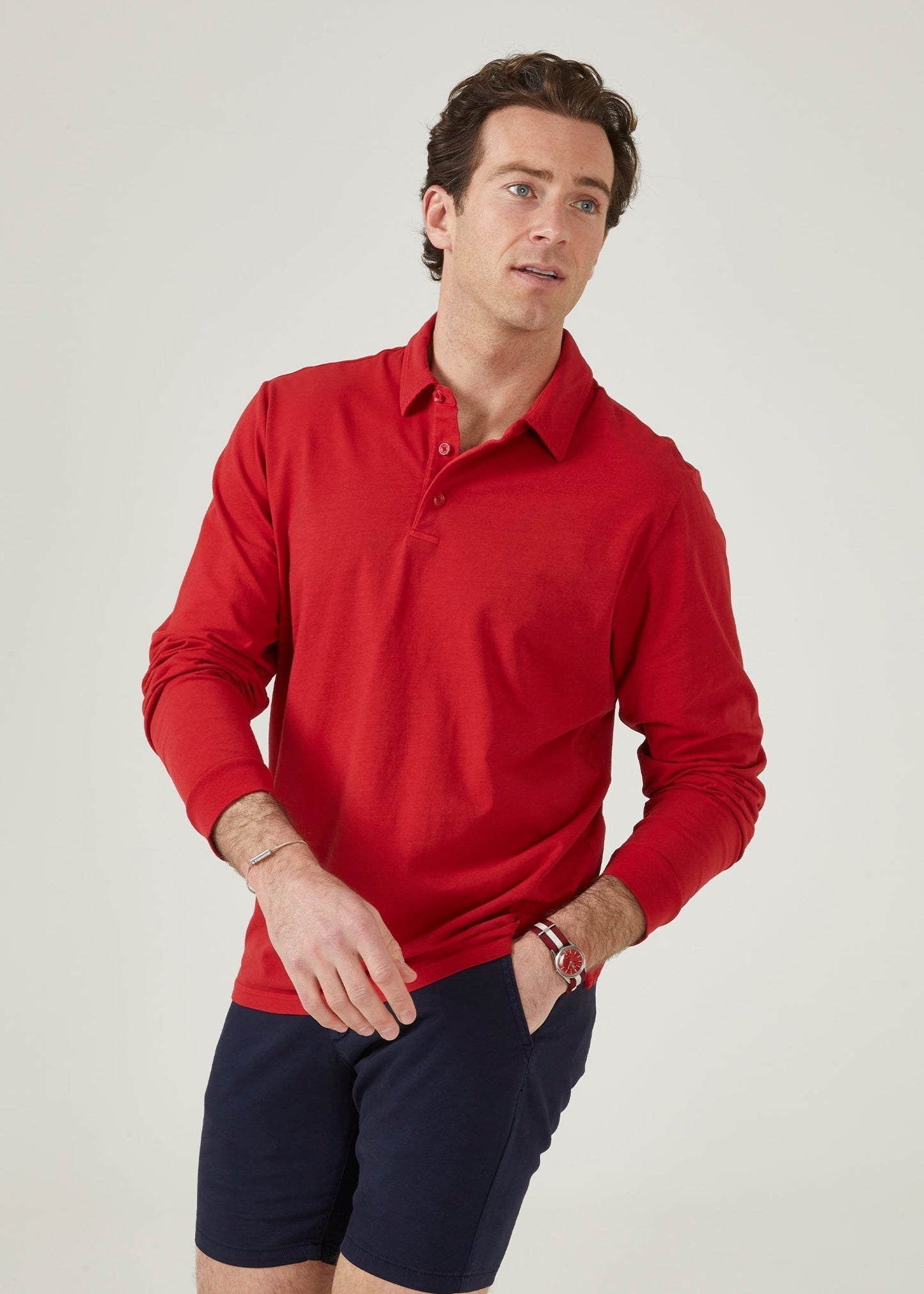 Faded dye polo shirt in rosso red made from a cotton/ spandex blend.